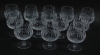 A set of twelve Waterford crystal brandy balloons decorated in the Colleen pattern.