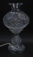 A Waterford crystal table lamp, with matching shade, 35cm high.