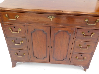 A Georgian style mahogany side cabinet, with a three division long drawer, over a pair of cupboard doors, opening to reveal a single shelf, flanked by six drawers, raised on out swept feet, 86cm high, 107cm wide, 52.5cm deep. - 3