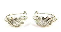 A pair of Art Deco style 14ct white gold and diamond earrings, set with baguette cut diamonds, 4.9g.