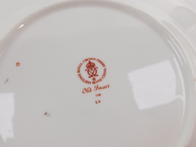 A Royal Crown Derby porcelain dinner plate decorated in the Old Imari pattern, together with a pair of tea plates, seconds, (3) - 3