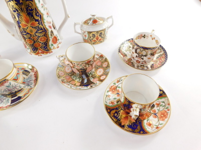 A Royal Crown Derby Imari porcelain part coffee service decorated in The Curator's pattern, comprising coffee pot, cream jug, sucrier, sixc offfee cans and saucers. - 2