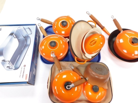 Various Le Creuset kitchen ware and pans, frying pan, 30cm diameter, other lidded pans, lidded tureen, open vegetable dish, and a stainless steel set, partially boxed. (a quantity)