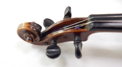 An early 20thC violin, with Arbort rest, ebonised tuning knops, scroll and interior pencil marks, possibly reading Elf, one piece curved back, 61cm long overall, with two nickel ended mother of pearl bows, in fitted case. - 4