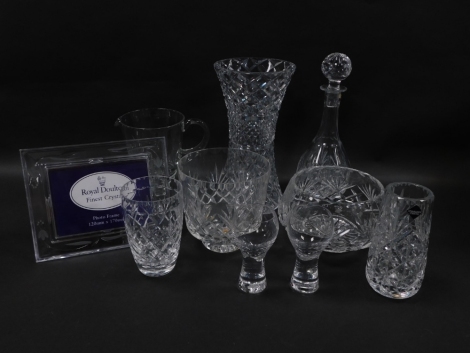 A group of cut glassware, including a Royal Doulton Fuchsia pattern photograph frame, 12cm high, 17cm wide, decanter and stopper, pair of Caithness wine glasses and a fruit bowl, vases, etc. (a quantity)