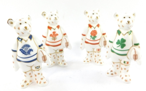 Four Royal Crown Derby Imari teddy bear Rugby figures, decorated with the emblems of the four UK nations.