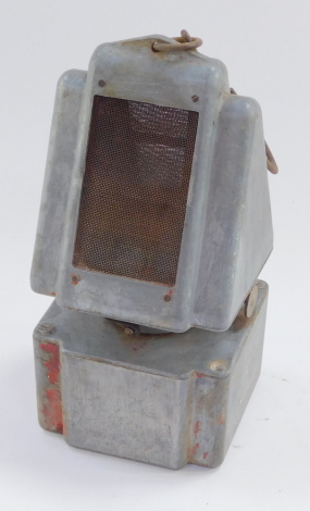 A radiator heater paraffin lamp, serial no 128775., 22cm high.