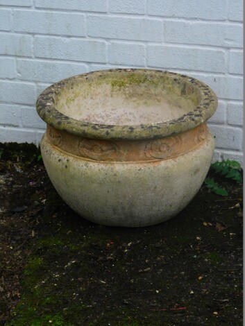 A concrete jardiniere planter, of circular form, 30cm high 48cm diameter.