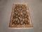 An Indian hand knotted wool carpet 4ft 10in x 8ft 1in