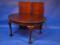 An early 20thC mahogany extending D end dining table