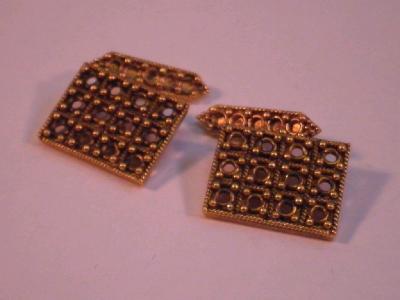 A pair of rectangular pierced cuff links stamped K22 (untested)<br