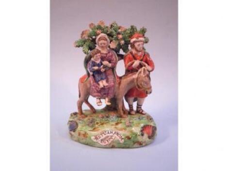 A 19thC Staffordshire group by Walton titled "Return from Egypt" depicting