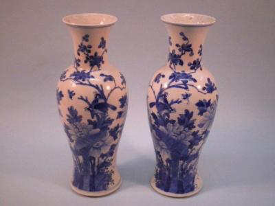 A pair of 19thC Chinese porcelain blue and white baluster vases