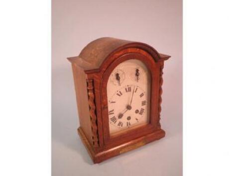 A 1920's oak mantel clock with Westminster chime