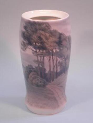 A Bing & Grondahl vase or lamp base decorated with trees within a landscape