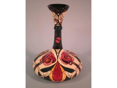 A modern Moorcroft "Melody" pattern bottle-shaped vase