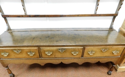 A late 18th/early 19thC oak dresser, the dresser back rack on sideboard with three drawers, with brass pierced handles, on part turned supports, 206cm high, 192cm wide, 51cm deep. - 2