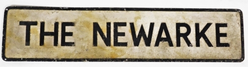 A black and white painted street sign, The Newarke, 23cm high, 101cm wide.