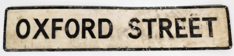 A black and white painted street sign, Oxford Street, 114cm x 23cm.