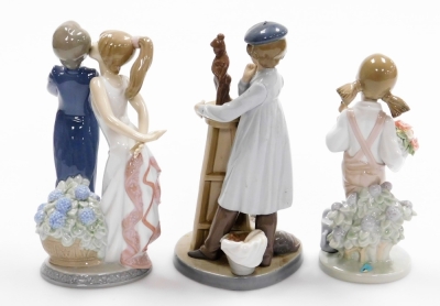 Three Lladro figures, to include a Bride and Groom no. 5555, 22cm high, a figure of a female and dog with sculpture, no. 5358, 21cm high, and another of a girl carrying a basket with bird no. 5217, 19cm high (3). - 2