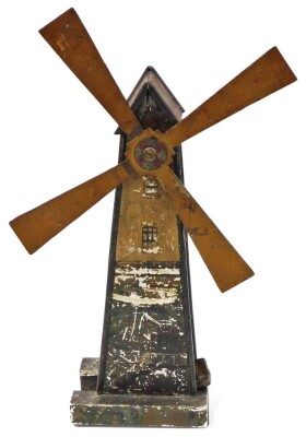 A late 19thC tin plate windmill, 43cm high.