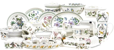 A group of Portmeirion Botanic garden part tea and dinner wares, comprising tureens, meat plates, side plates, napkins, butter dish and cover, milk jugs, coffee pot, vase, toast rack, pepper pot, vinaigrettes, etc. (a quantity)