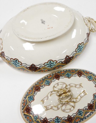 An early 20thC Royal Doulton tureen and cover, heavily decorated with flowers with blue and gilt banding, and knot tie handle, 21cm high, 39cm wide. - 3