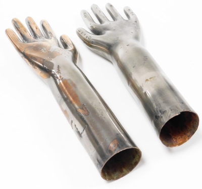 A set of silvered metal hand displays, possibly glove formers, 37cm high. - 2