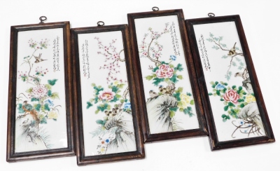 GA250821 A set of four late 19thC Chinese porcelain panels, each decorated with birds and flowers, in stained mahogany frames, 46cm x 20cm. (4)