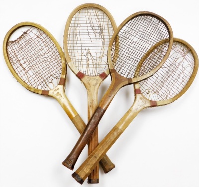 Four tennis rackets, to include one stamped FA Davis Ltd Brooks Market London, another unmarked, another marked CAL and another stamped AG Spalding & Bros Brighton. (4)