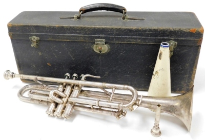 A Selmer Rolls Diplomat silver coloured cased trumpet, with two mouth pieces.