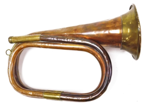 A brass bugle, stamped Premier.