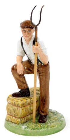 A Royal Doulton Classics Farmer figure, HN4487, (AF), 20cm high.