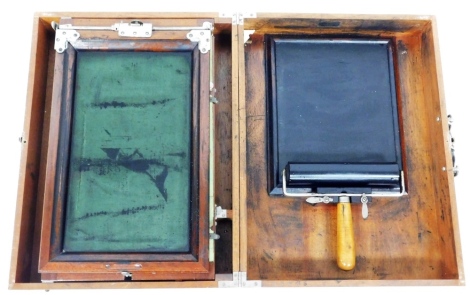 An Ellams cased diaphragm model printing press, with roller and boards, in carry case, 36cm high, 51cm wide, 16cm deep.