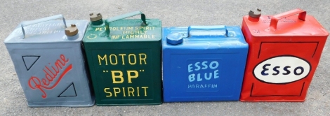 A group of ESSO and other petrol cans, to include an ESSO blue paraffin later painted tin, a Motor BP spirit petrol can, a Red Line petrol can and an ESSO red petrol can. (4)