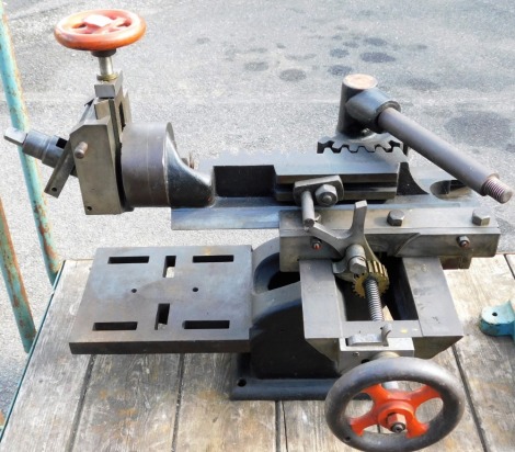 An early 20thC hand operated shaping machine.