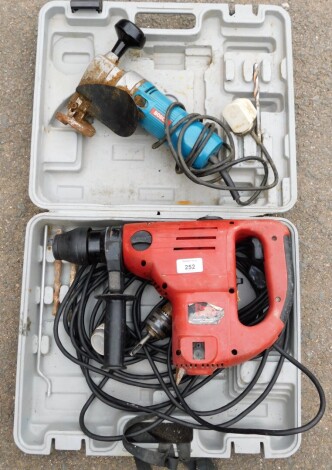 A Power Devil rotary hammer drill and a Bosch shearing tool, both 240V.