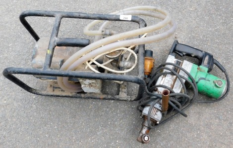 A high impact jack hammer and a residual motorised frame. (2) Buyer Note: WARNING! This lot contains untested or unsafe electrical items. It is supplied for scrap or reconditioning only. TRADE ONLY