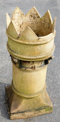 A Victorian stone chimney pot, with turret top and pierced body, 81cm high.