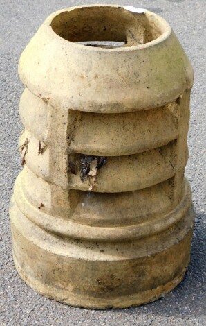 A Victorian stone chimney pot, turret top 50cm high.