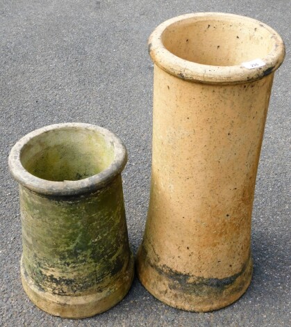 Two reconstituted stone chimney pot, 62cm high and 38cm high.