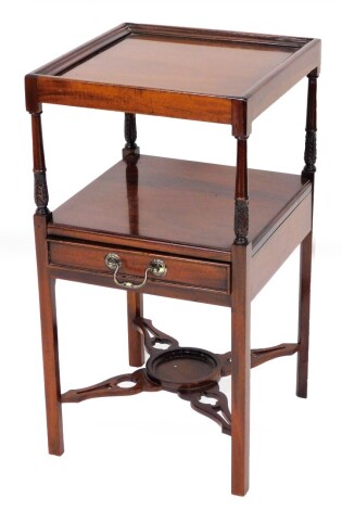 A mahogany wash stand in George III style, with shelf top on single section with single drawer and pierced bowl stand, 70cm high, 37cm wide, 37cm deep.