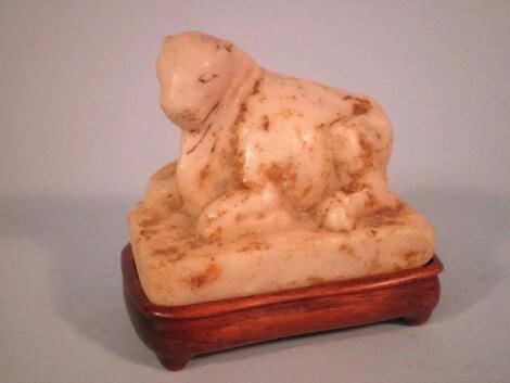 An Eastern alabaster carving of a seated cow