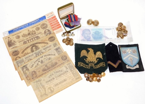 A group of Military ephemera, to include shoulder badges, uniform badges, North Carolina one dollar notes, Military buttons, banknotes, medal ribbons, collar studs, etc. (a quantity)