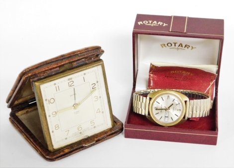 A Smith's crocodile skin cased travel clock, and a Rotary gentlemans wristwatch, boxed. (2)