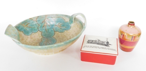 Various ceramics, to include a Crown Devon floral bowl, a Crown Ducal red and orange bud vase, 10cm high, and a Grey's pottery reproduction of British Railways collectors tin inscribed Lion Of The Liverpool and Manchester Railway and Star of the Film The