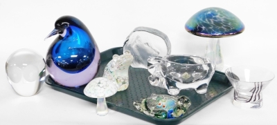 A group of art glass, to include an art glass mushroom paperweight, a crystal lion head, smaller mushroom, a French crystal pig, a Caithness glass bowl, owl, polar bear and penguin, etc. (a quantity)