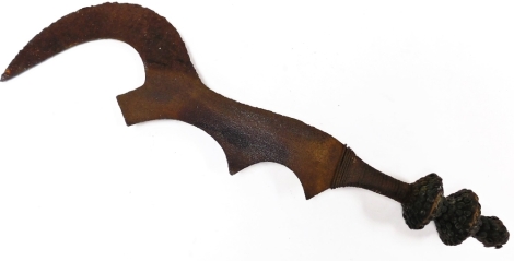 Tribal Art. A metal bladed sword, with stud decoration to the handle, 67cm long.