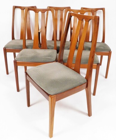 A set of six Nathan teak dining chairs, comprising carver and five chairs, each with blue and red upholstery, 96cm high, 48cm wide, 42cm deep.