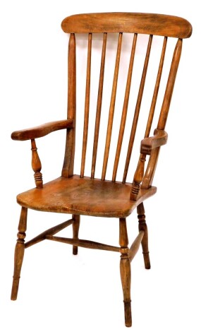 A 19thC spindle back Grandfather chair, 119cm high, 58cm wide, 44cm deep.